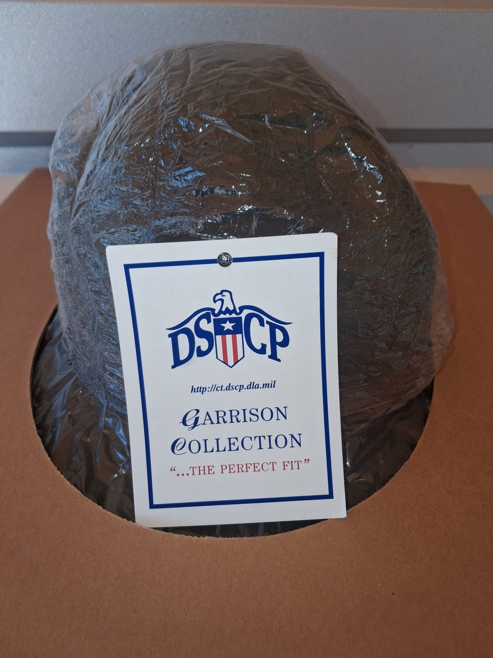 Vintage DSCP Garrison Collection black beret Sargent hat. Exact size unknown.
